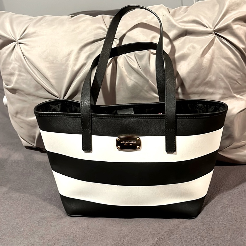 Beautiful Michael Kors purse with black silky material inside.  Super stylish!